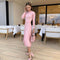 Elise - Ribbed knit midi dress with flared hem