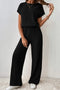 Noor – Zwarte Geribbelde Jumpsuit met Wijde Pijpen voor Dames
