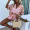 Yasmine - floral playsuit with belt