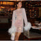 Esmee | Transparent party dress with feathers