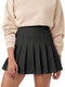 Daphne | High-waisted pleated skirt with lined shorts