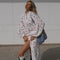 Charis - Long shirt dress with a high collar and a striped heart print