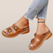 Sandals – Slip-on style with adjustable buckles and perforated detail