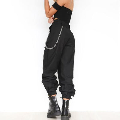 Monica - High-waisted harem pants with chain strap