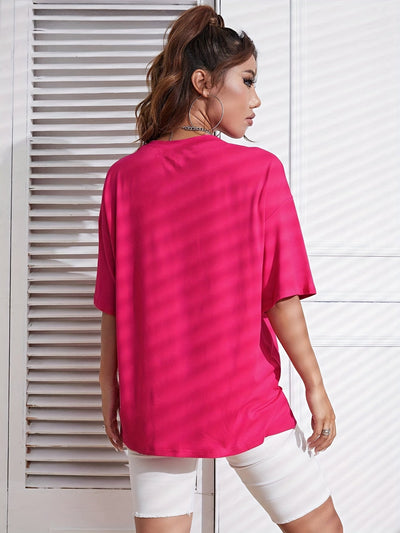 Sara | Sportief Y2K T-shirt in effen kleur met ronde hals en losse korte mouwen