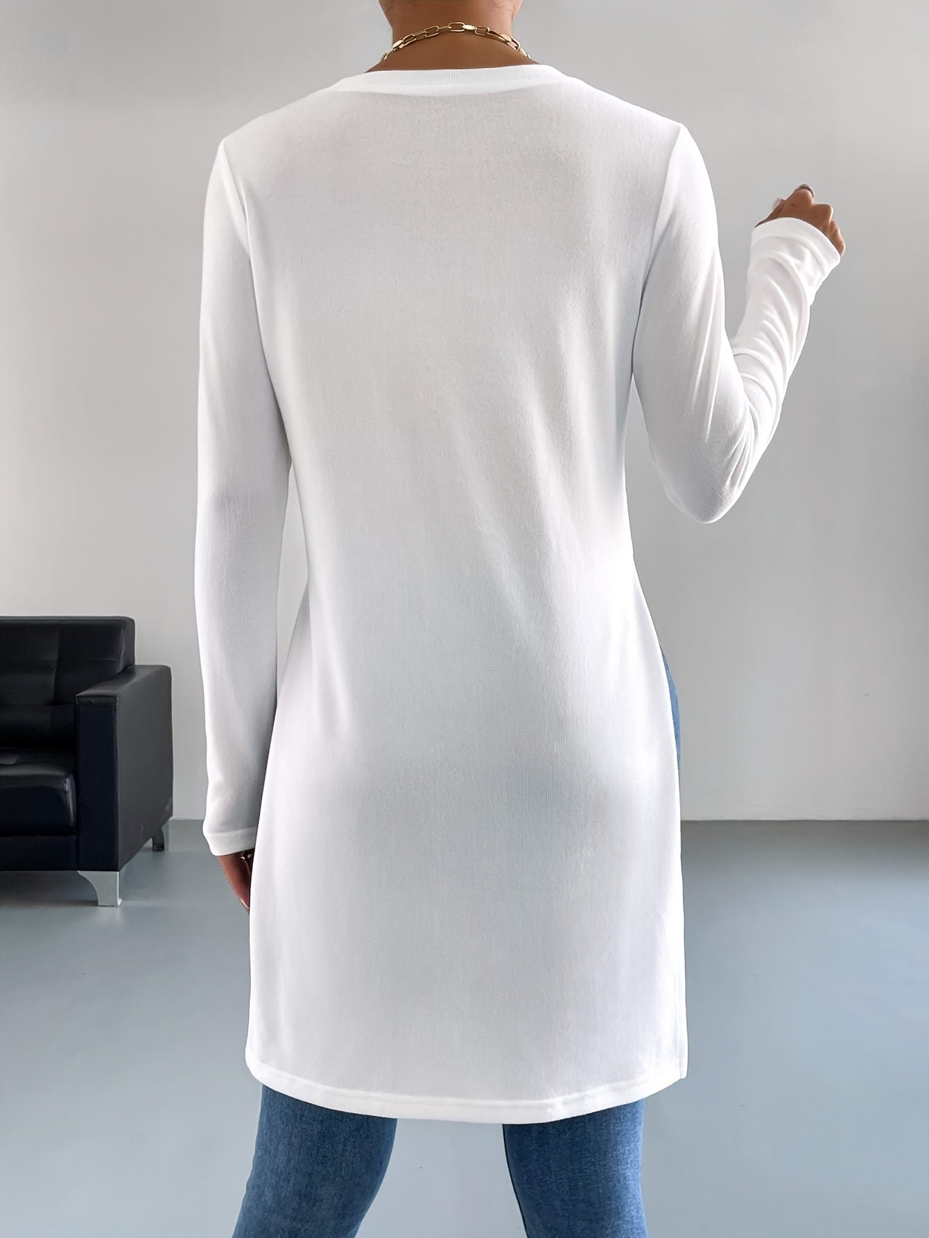 Nina | Stijlvol effen kleur t-shirt met lange mouw en zijsplit