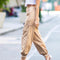 Monica - High-waisted harem pants with chain strap