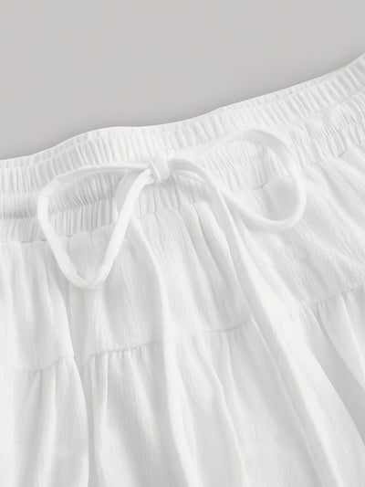 Lara | High-waisted pleated A-line mini skirt