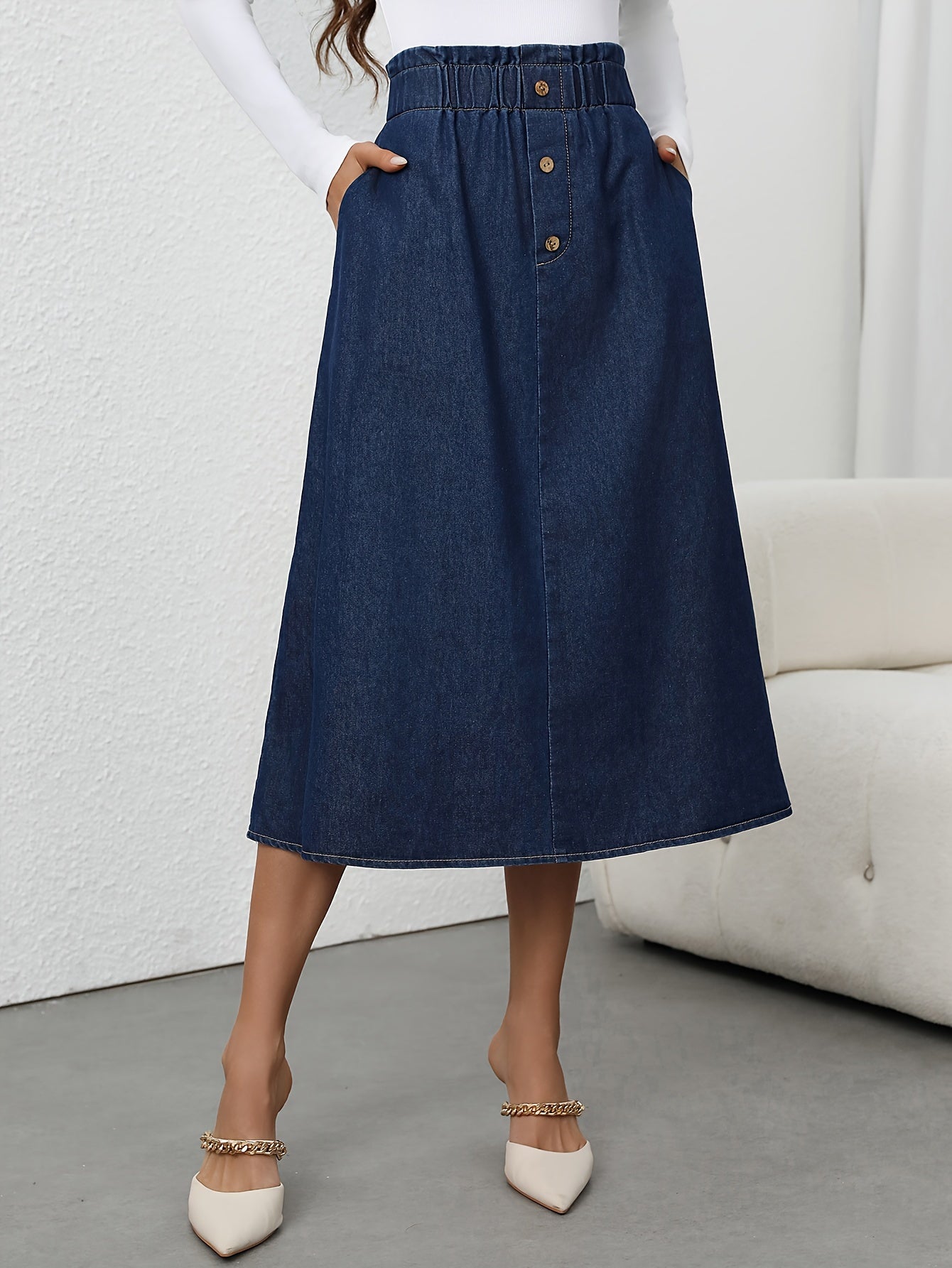 Fleur | High-waisted denim A-line midi skirt with button closure