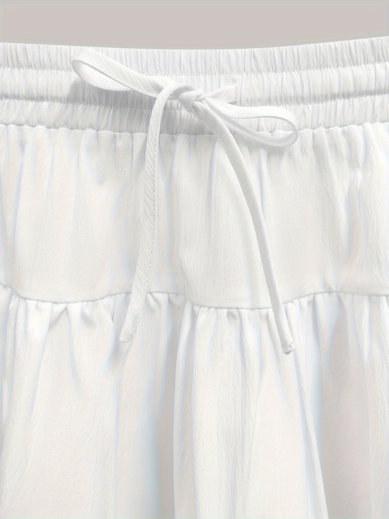 Lara | High-waisted pleated A-line mini skirt