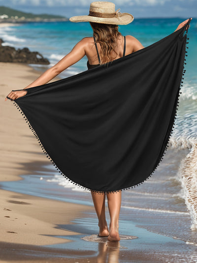 Emma | Effen maxi strandjurk met pom-pom-decor en V-hals