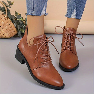 Loes | Stylish solid-color boots with lace-up closure and block heel