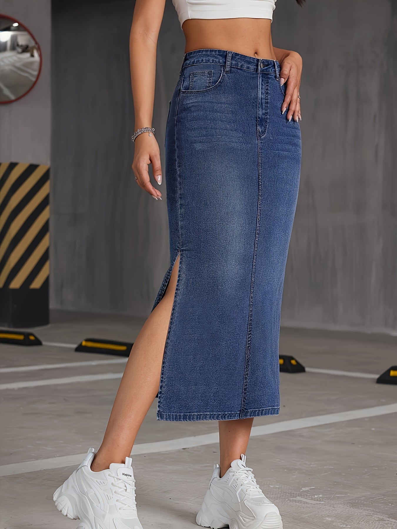 Nina | Blauwe denim midi-rok met hoge taille en schuine zakken