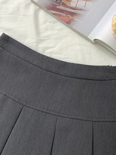 Nina | Mooie geplooide minirok met hoge taille in effen kleur