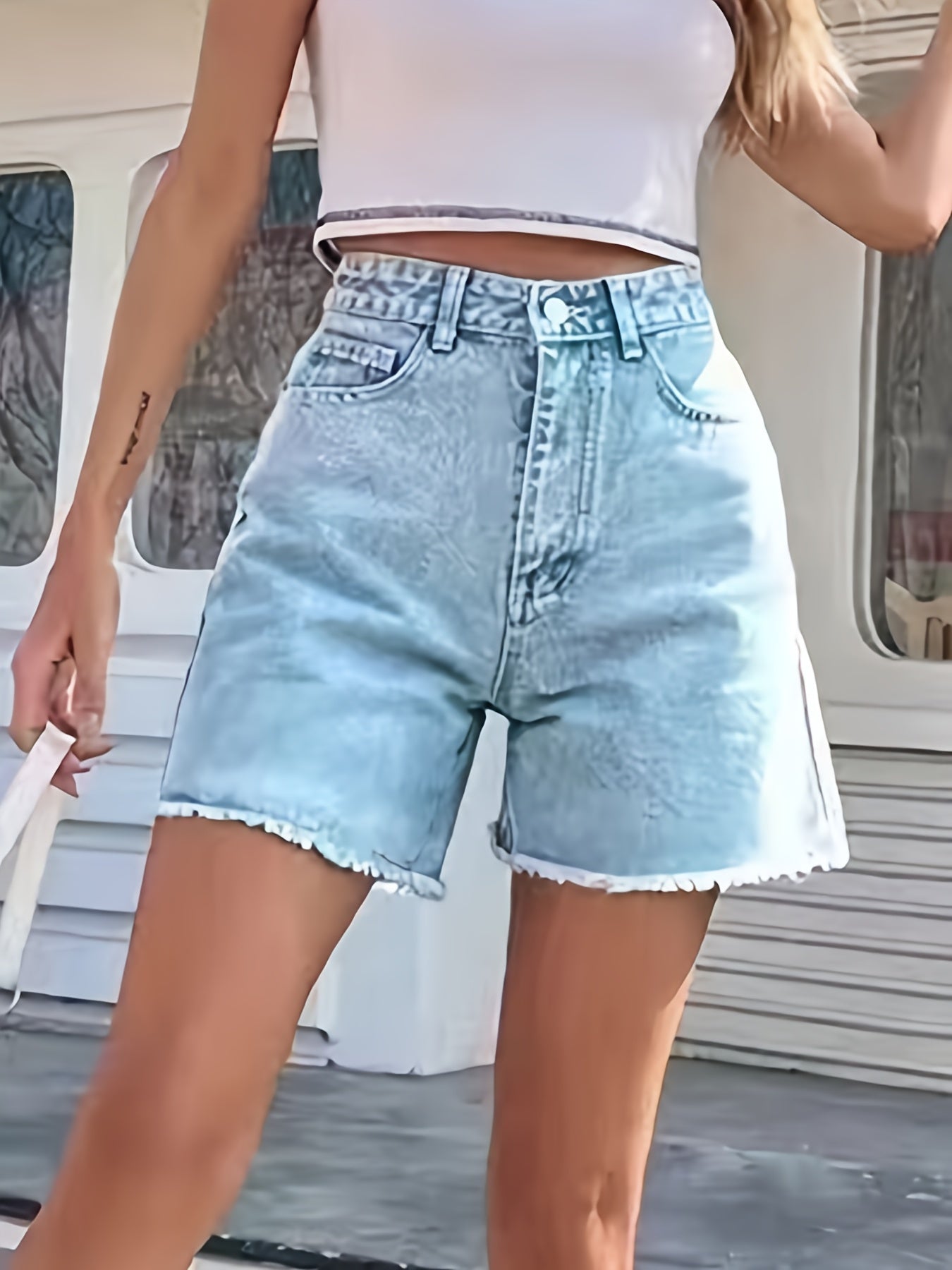 Lotte | Washed denim shorts with a frayed hem and a loose fit
