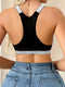 Lotte | Wireless sports bra in solid color with silver strap detail