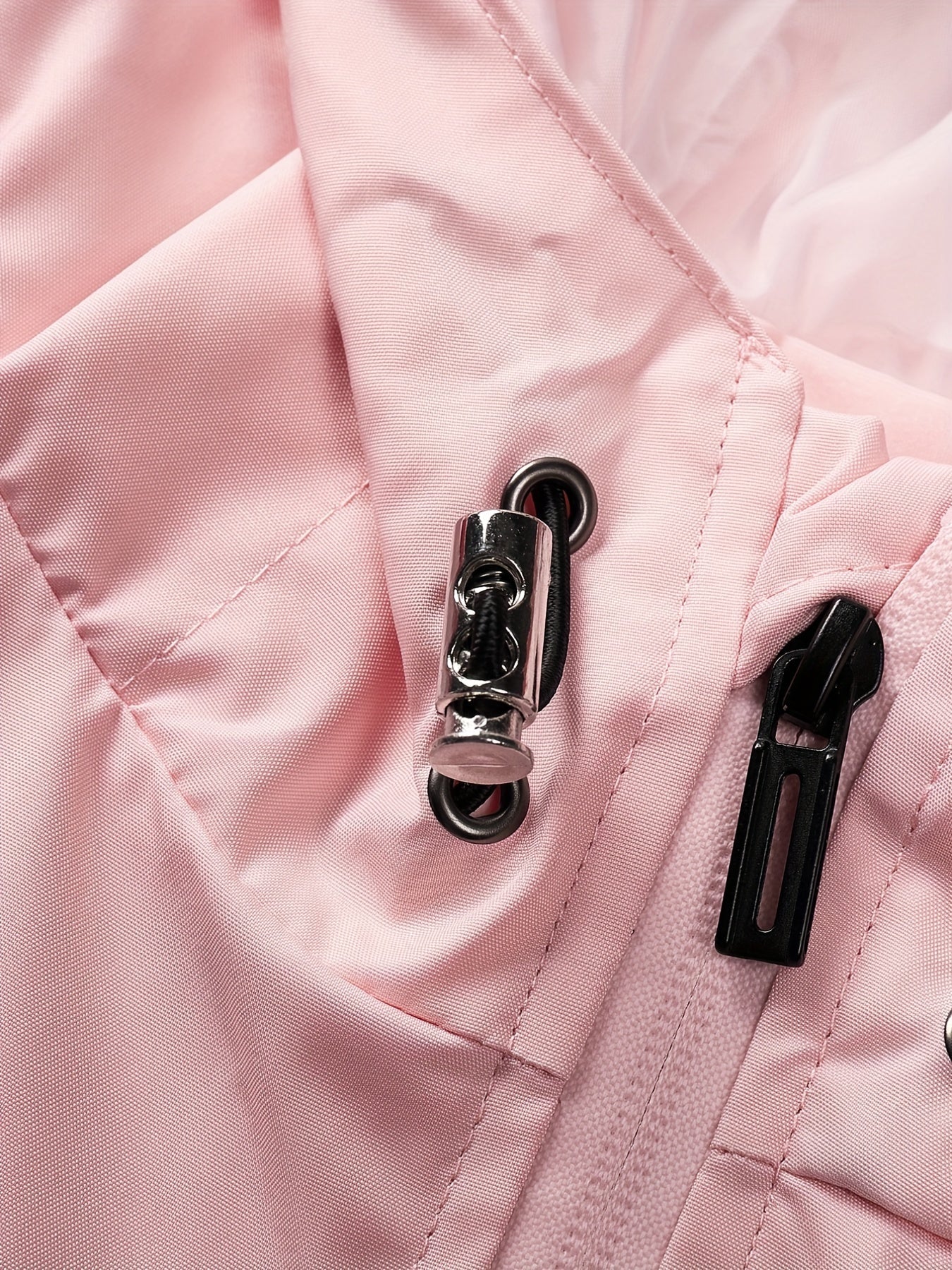 | Linde | Sportieve dames outdoorjas met capuchon in bijpassende kleuren en ritszakken