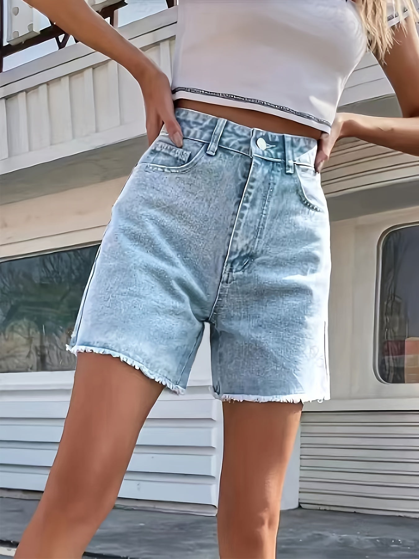 Lotte | Washed denim shorts with a frayed hem and a loose fit