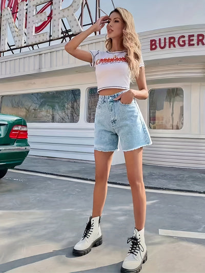 Lotte | Washed denim shorts with a frayed hem and a loose fit