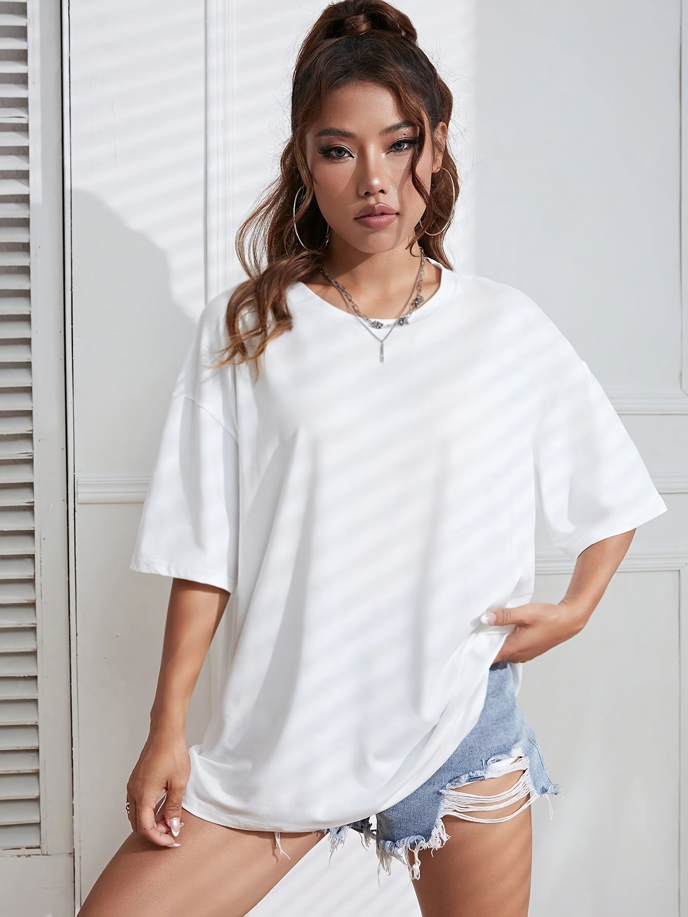Sara | Sportief Y2K T-shirt in effen kleur met ronde hals en losse korte mouwen