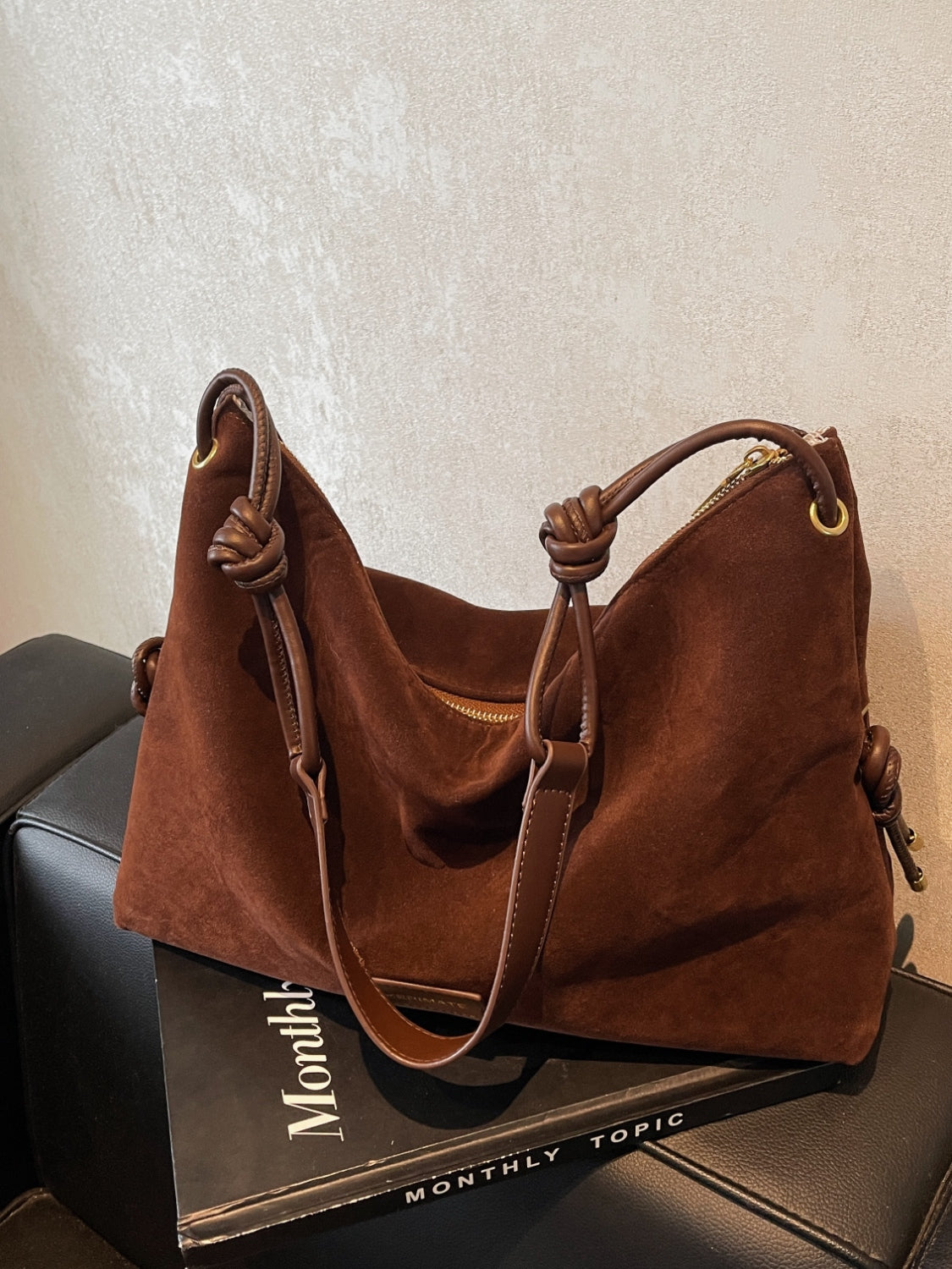 Grote suède handtas