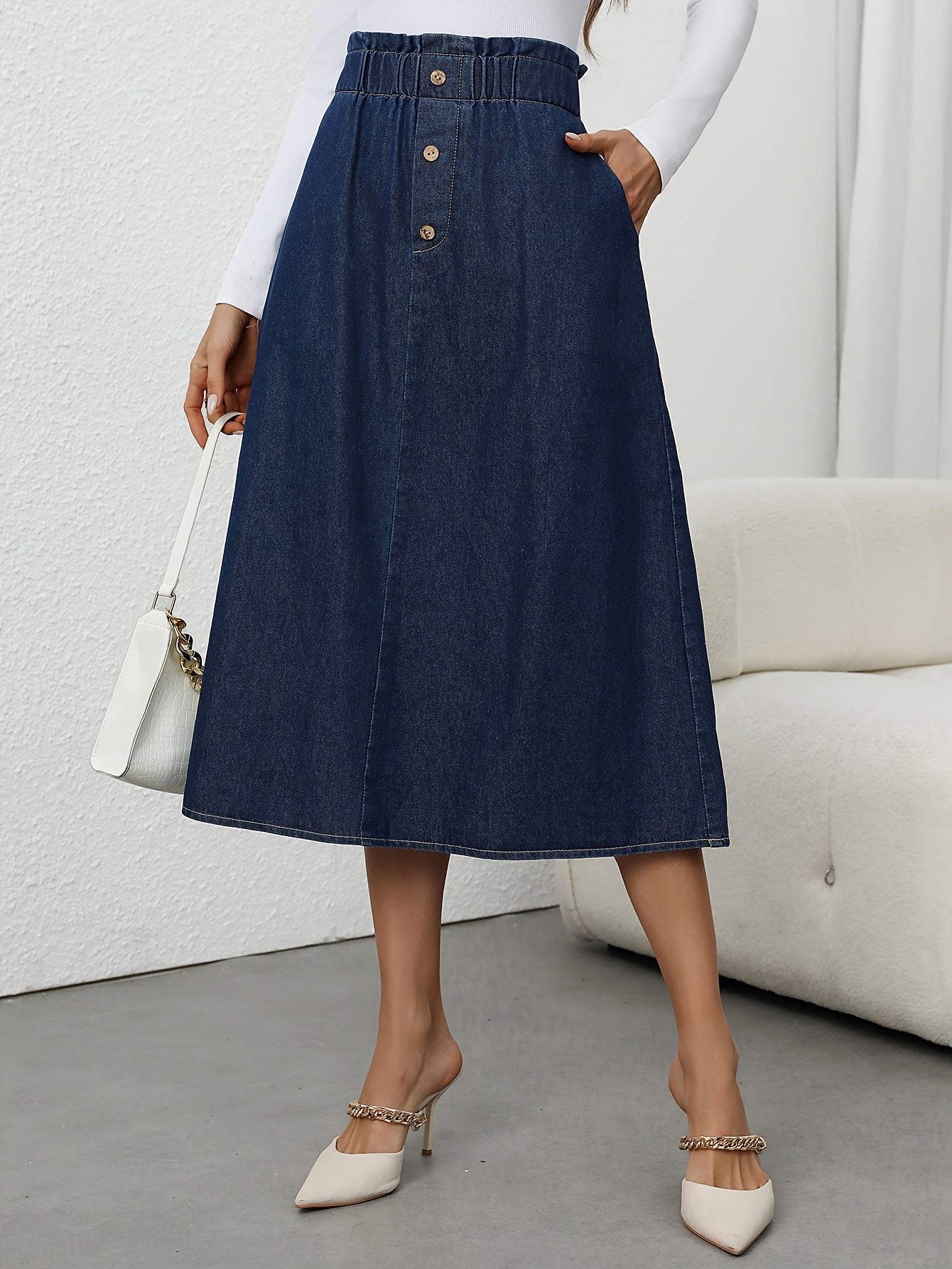 Fleur | High-waisted denim A-line midi skirt with button closure