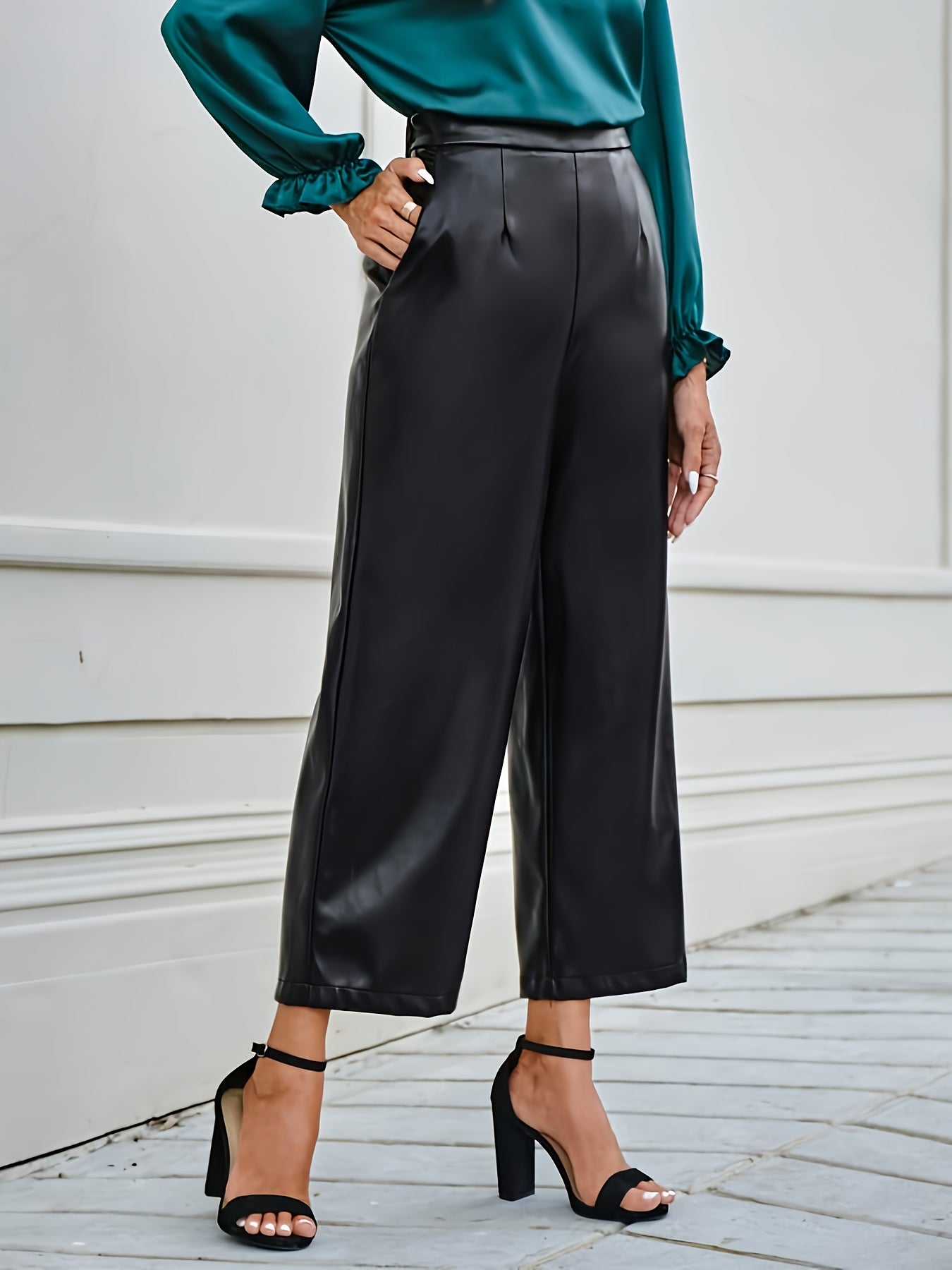 Evelien | Solid color faux leather pants with a high waist and straight legs
