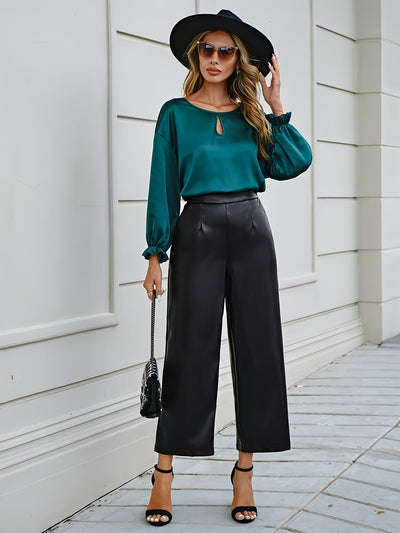 Evelien | Solid color faux leather pants with a high waist and straight legs