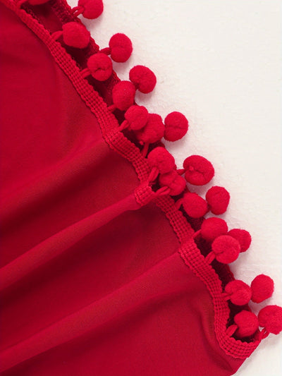Emma | Effen maxi strandjurk met pom-pom-decor en V-hals