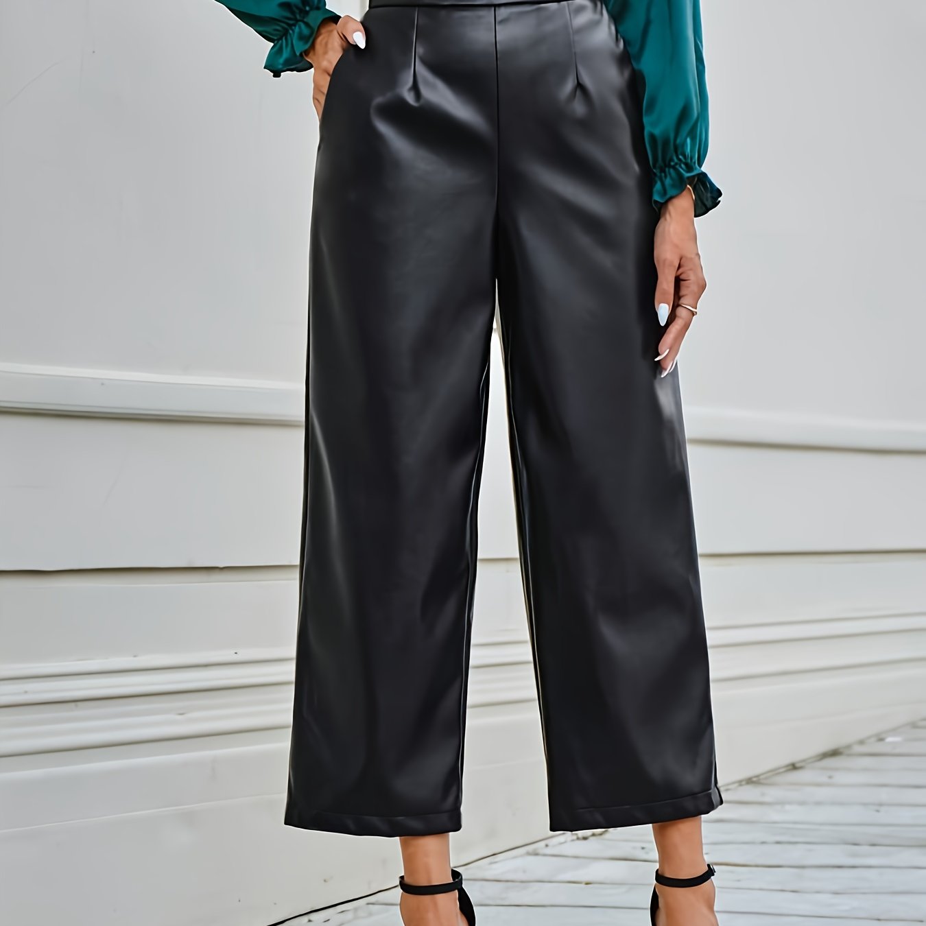 Evelien | Solid color faux leather pants with a high waist and straight legs