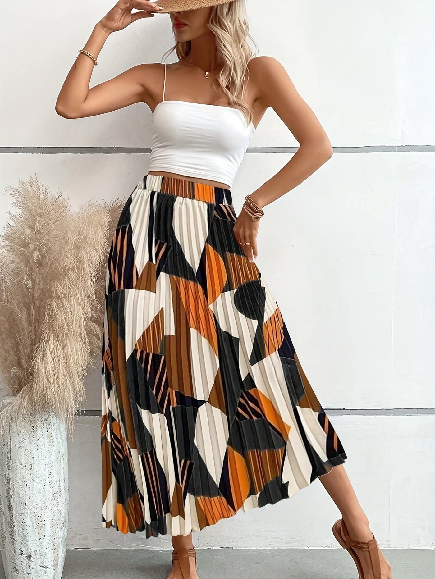Elise | Pleated skirt with allover geo print