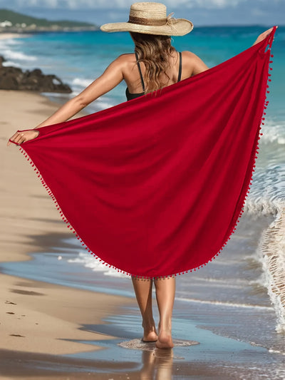 Emma | Effen maxi strandjurk met pom-pom-decor en V-hals