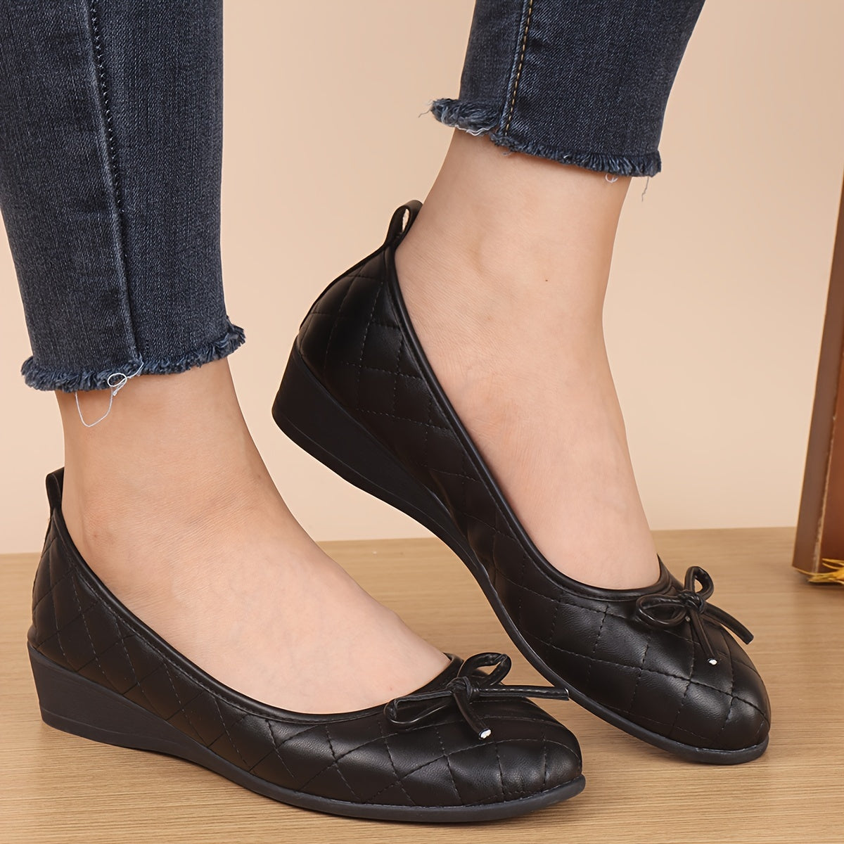 Lotte | Women's black ballerinas with stitched design and bow detail
