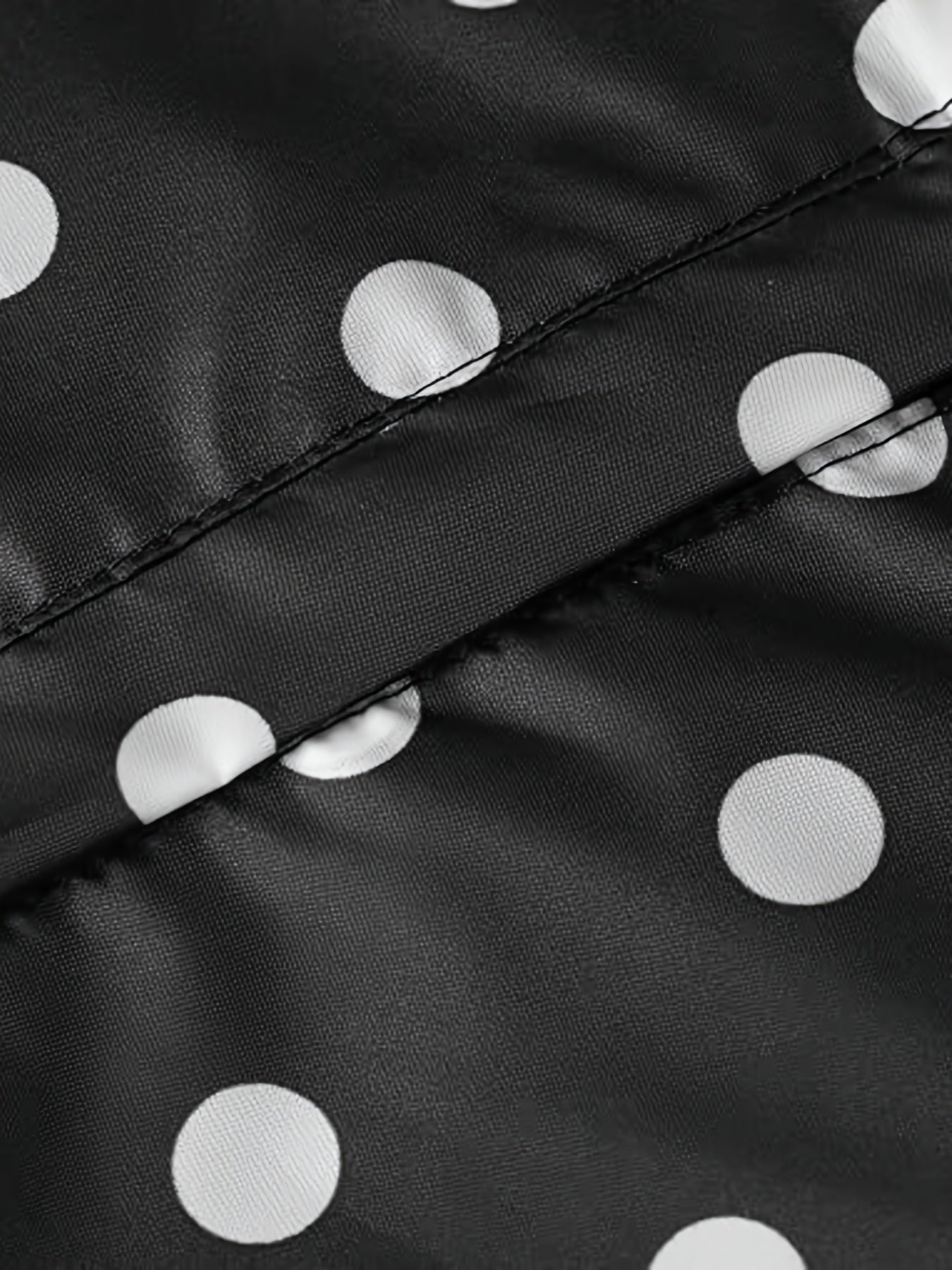 Femke | Lichtgewicht regenponcho-jack met stippenpatroon