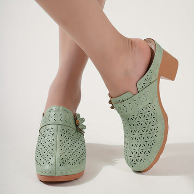 Flora | Women's mules with a thick heel and perforated floral decoration