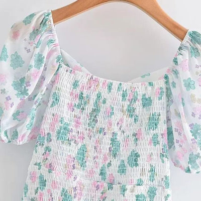 Fioby - Mini jurk met bloemen ruches en pofmouwen
