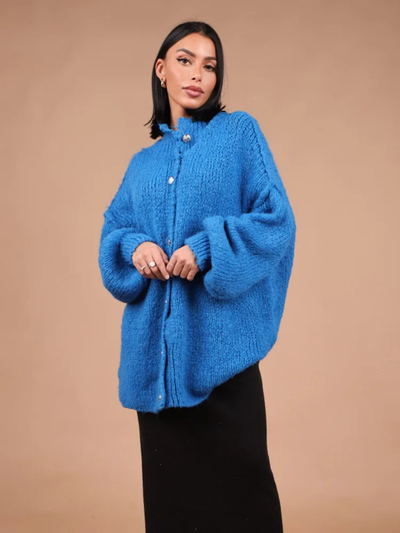 Knitted women's cardigan with buttons – Oversized model with balloon sleeves 