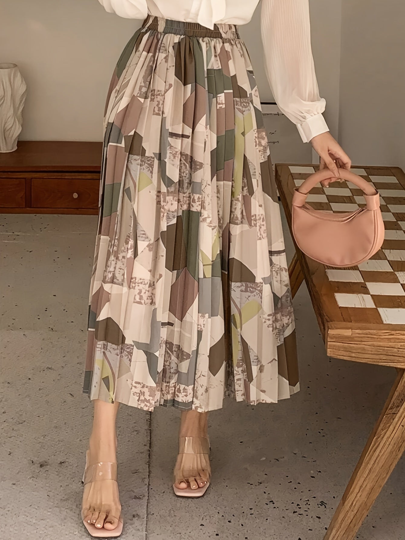 Lotte | Elegant allover print pleated A-line skirt