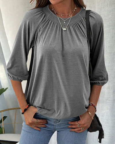 Dames top – Losvallende top met ronde hals en plooidetail