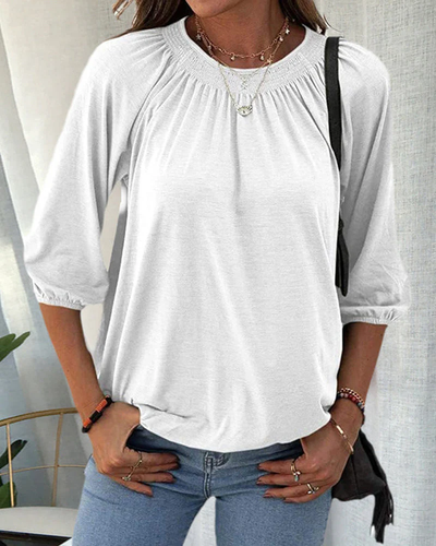 Dames top – Losvallende top met ronde hals en plooidetail