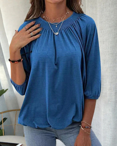 Dames top – Losvallende top met ronde hals en plooidetail