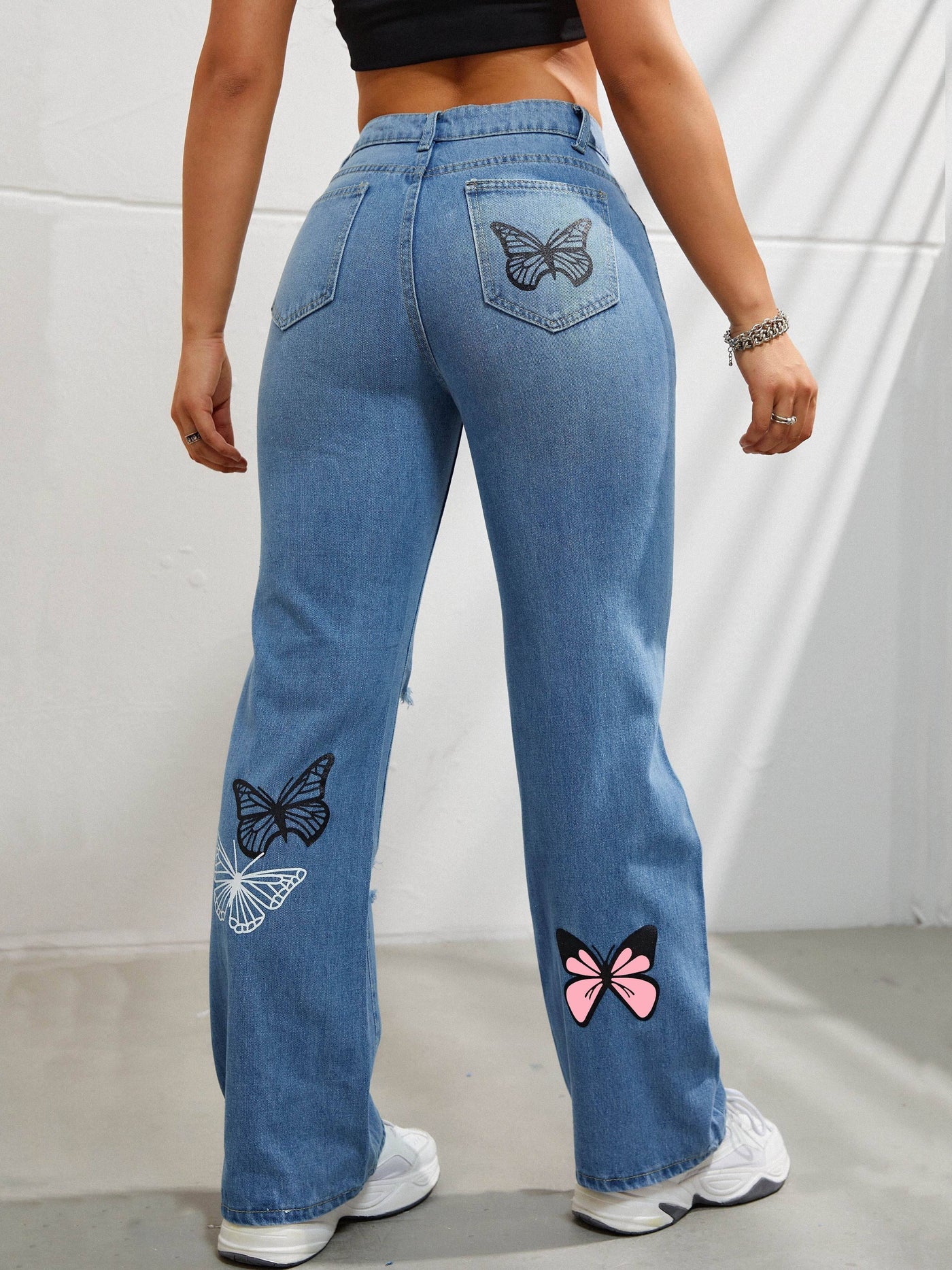 Ava | Losvallende Vlinderprint Jeans met Ripped Details voor Dames