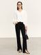 Briana | Elegante Blouse met Open Rug en Strikdetail