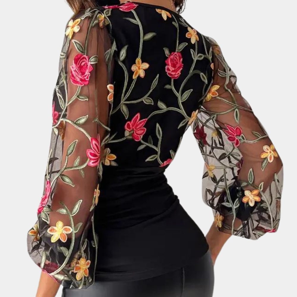 Elegant ladies' top with floral embroidery