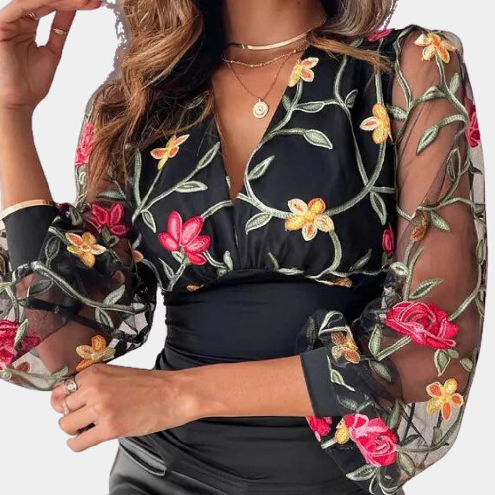 Elegant ladies' top with floral embroidery