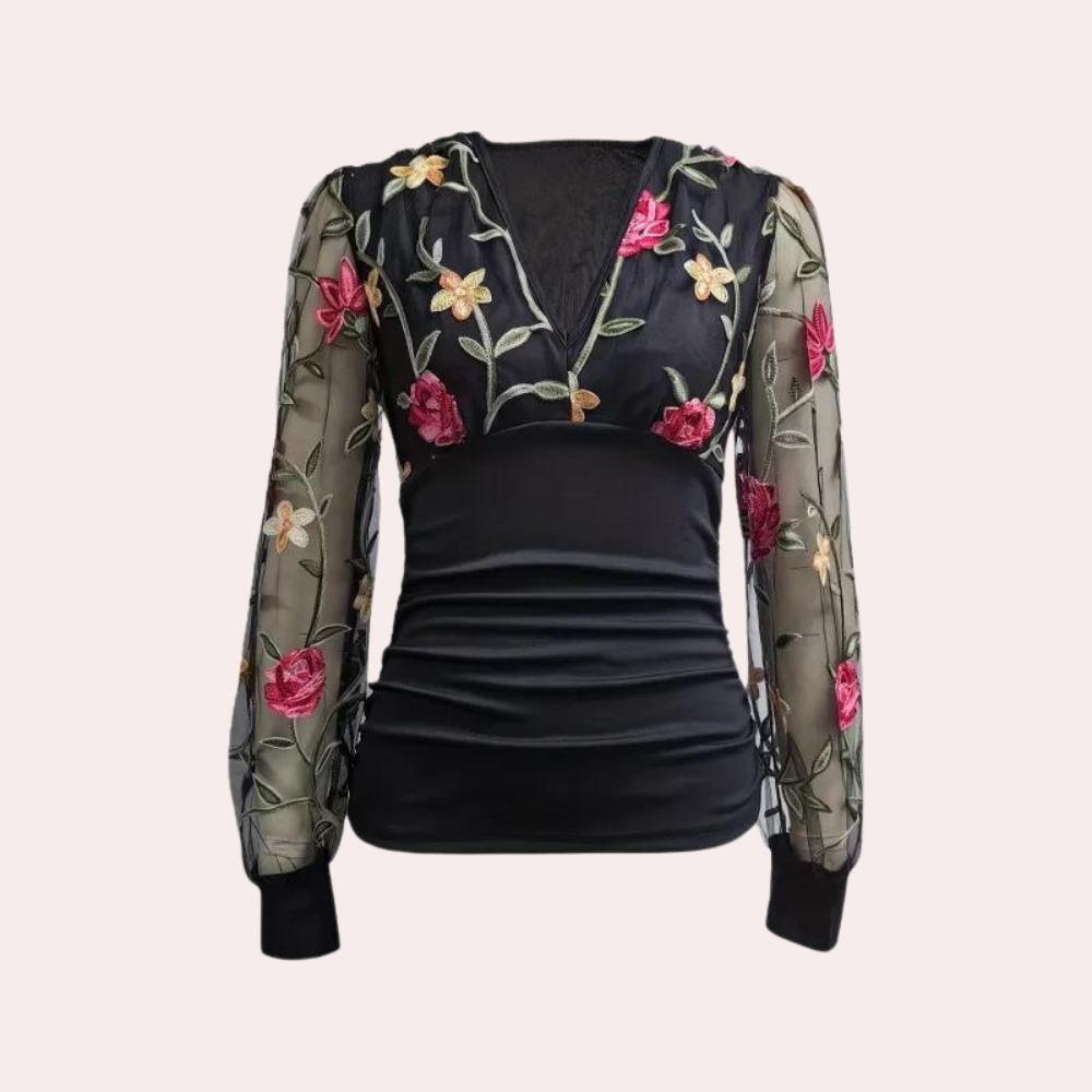 Elegant ladies' top with floral embroidery