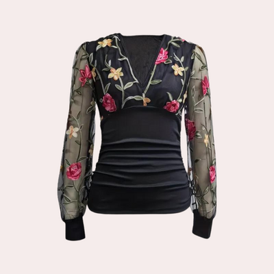 Elegant ladies' top with floral embroidery