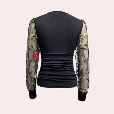 Elegant ladies' top with floral embroidery