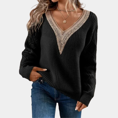 Knitted women's top with long sleeves