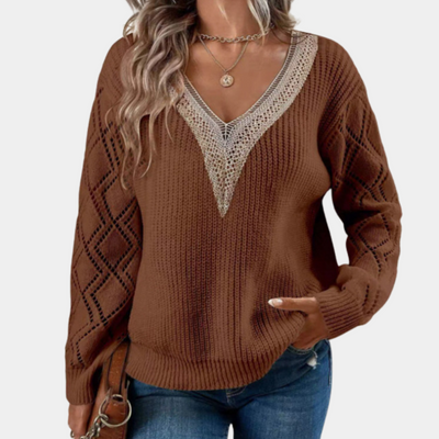 Knitted women's top with long sleeves